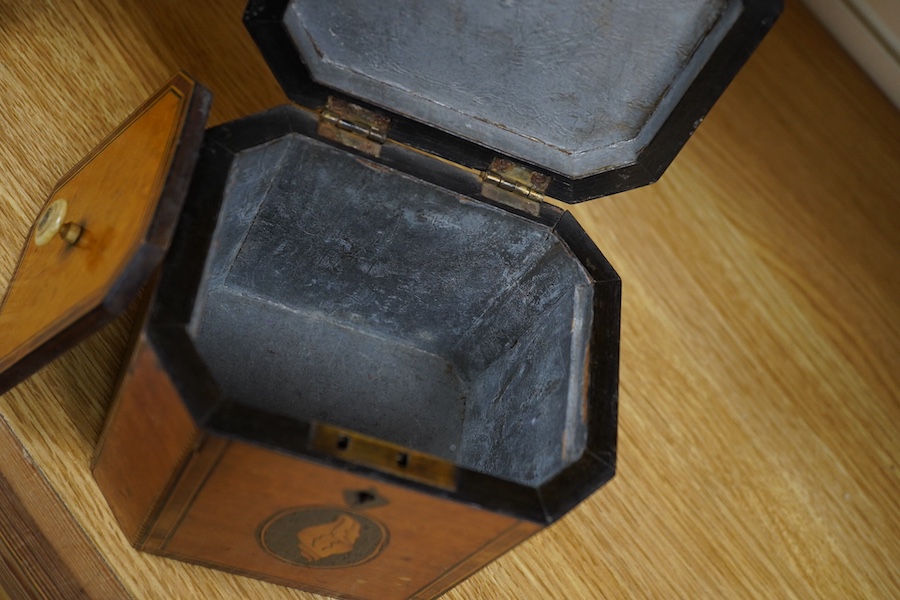 A George III Sheraton period octagonal West Indian satinwood and marquetry tea caddy, 12cm high. Condition - fair